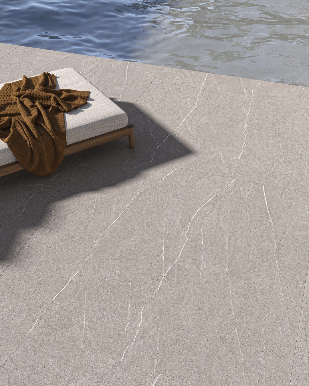 Borda de piscina com Piasentina Grey da Biancogres